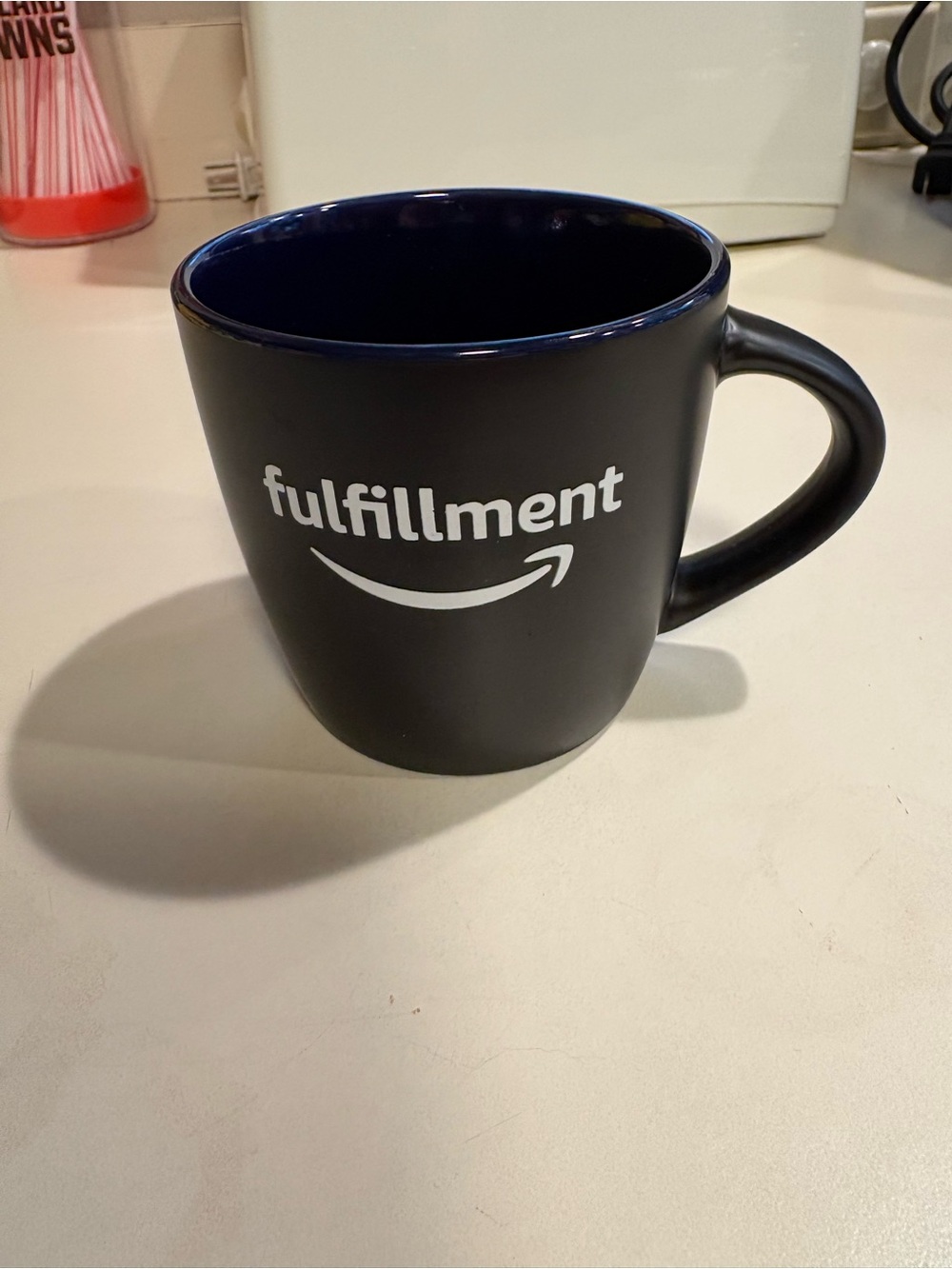 Amazon Black Ceramic 'fulfillment' Logo Mug with Dark Blue Interior